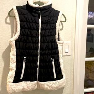 Workshop Republic clothing size large puff vest with white accents.